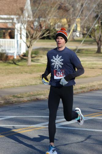 Kevin Burke of Athens was the overall winner of the Winterville Civitan Snowflake 10k on Jan. 29, with a time of 36:17.6 for a pace of 5:51. Chris McCann of Waltham, Massachusetts, finished second (36:36.1) and Kaylee Slade of Winterville finished third overall (first female) with a time of 36:45.4. (Mackenzie Tanner/The Oglethorpe Echo)