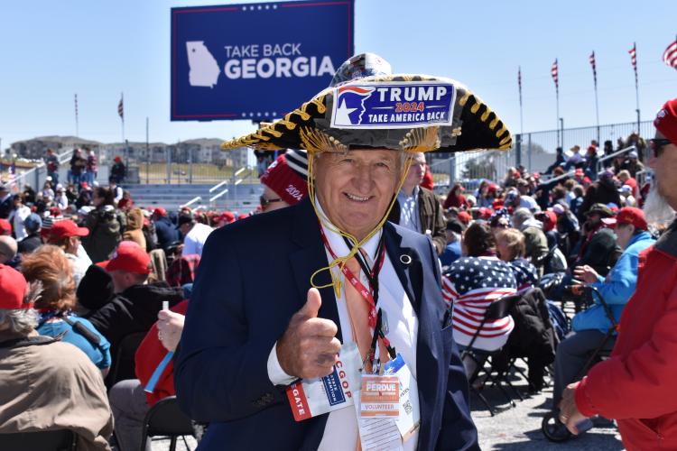 Dancing and chanting characterized the eager crowd of people of all ages and parts of the country, united over their conservative values. For some, it was their first Trump rally, while for others it was one of many, including one man, James Yates, referring to himself as “Sombrero Trump,” claiming it was his 70th in total. (Kate Hoffman/The Oglethorpe Echo)