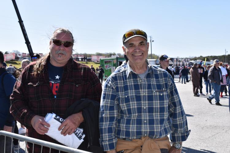“I’ve told everyone it's like a festival, (or) a Grateful Dead show,” says Oglethorpe County’s Ray Channell (right), as he stands in a sea of people with old school rock music playing in the background. “It’s a big party, so much fun.” Rows in front of Channell, a large group of supporters dances near the stage as they wait for the upcoming political speeches.” (Kate Hoffman/The Oglethorpe Echo)