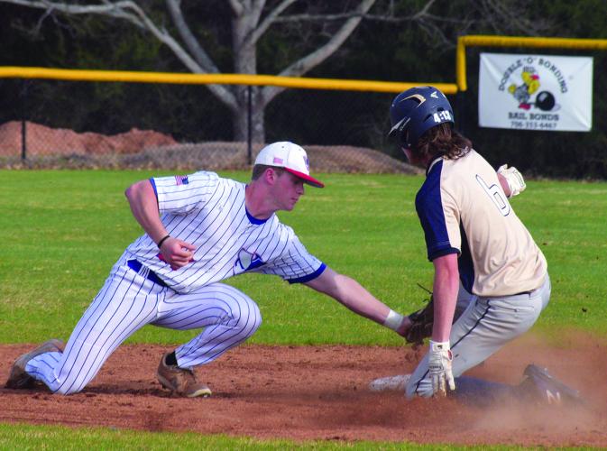 OCHS senior shortstop Landon Eberhart attempts to tag a runner in the Patriots' 6-3 victory over Jefferson County to remain undefeated in Region 4-AA on Tuesday. Ralph Maxwell/Submitted photo