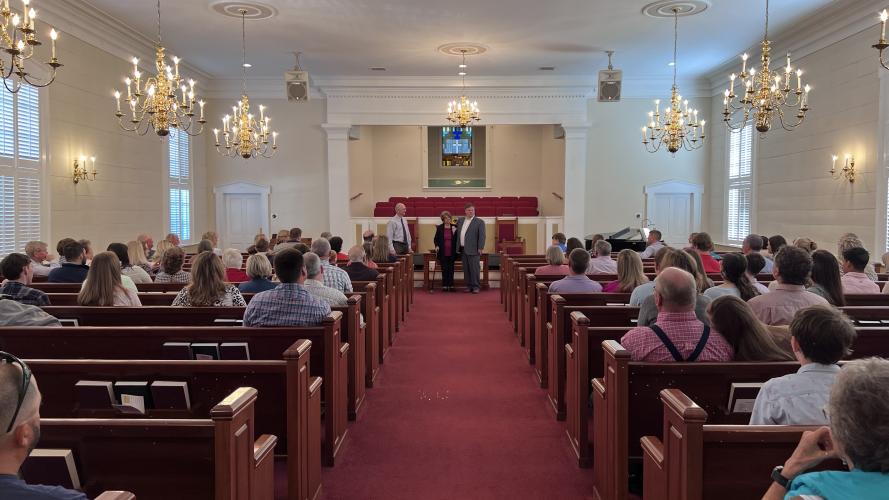 Rev. Gil Maddox and Pastor Brett Mask honor Nina Hayes for her 59 years of service to the church as the congregation watches. Brett Mask/Submitted photo