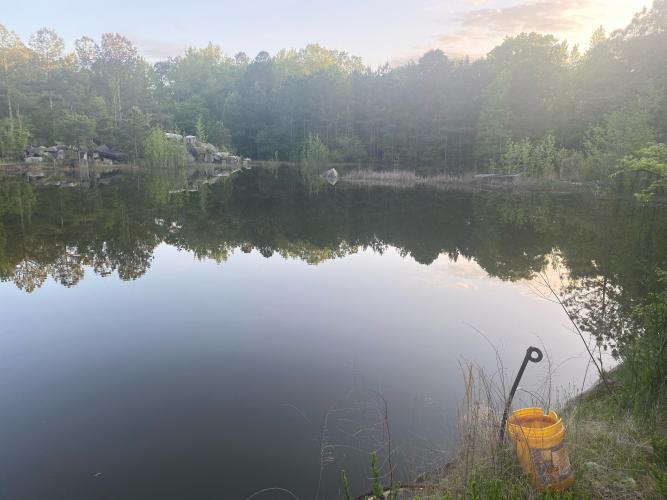 Sheriff David Gabriel and other law enforcement officials are searching an abandoned quarry for the remains of Jimmy Anglin. (Photo/Dink NeSmith)