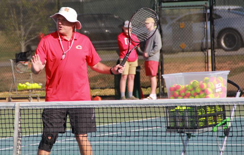 Lloyd Martin preps his youth class before beginning backhand drills. Martin hopes to spark tennis programs in Oglethorpe County. (Armani Kardar/The Oglethorpe Echo)