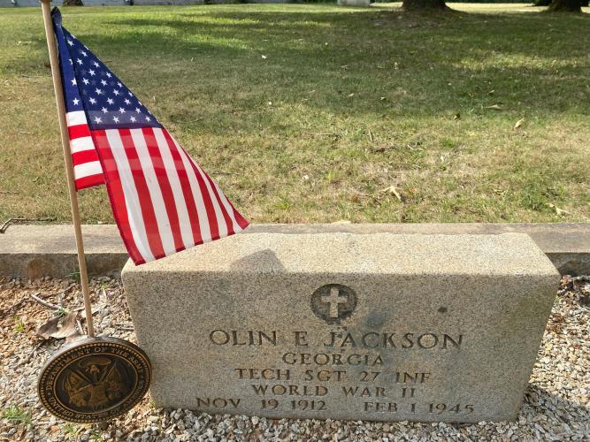 U.S. Army Tech Sgt. Olin Emmett Jackson Jr. is buried in Central Methodist Church Cemetery in Stephens. He has a bronze medallion, placed by the U.S. Department of the Army, near his headstone. (Photo/Dink NeSmith)