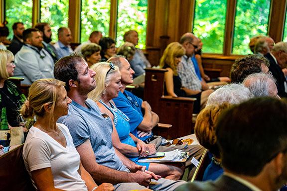 Guests fill the pews at the State Botanical Garden of Georgia’s Day Chapel during the memorial service for Rick Berry, who owned Goodness Grows and was the mayor of Lexington. (Photo/Jack Casey)