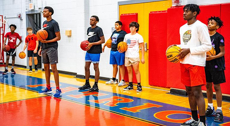 Campers line up to participate in drills at the Larry Brown Basketball Camp at the OCHS gym last week. The campers worked on their basketball skills from 9 a.m.-1 p.m. daily. (Photo/Jack Casey)