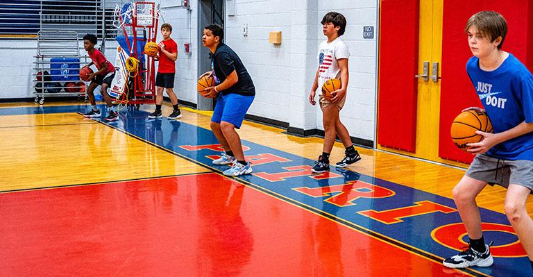 Drills at the Larry Brown Basketball Camp focused on “fundamental skills through instructional small group coaching and live games,” according to the camp brochure. Brown is the boys basketball coach at OCHS. (Photo/Jack Casey)