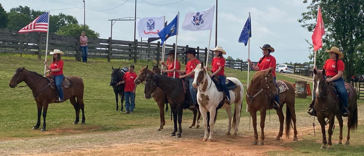 Worshipers gathered May 1 at Smithonia’s Double H Ranch for the monthly service of Branded Cowboy Church, hosted by Horace Hudson and his wife, Dr. Marcie Simpson. The nondenominational congregation celebrated Mother’s Day and Memorial Day. (Photo/Dink NeSmith)