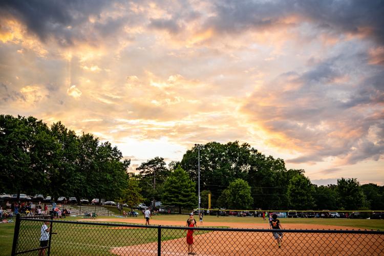 A group of kickball players took advantage of a rec league field for a game at the Fourth Annual Independence Day Celebration. (Photo/Jack Casey)