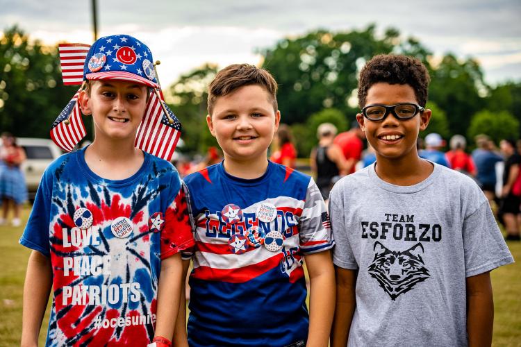 Crawford’s Easton Young (from left), Tyson Cole of Arnoldsville and DJ Faust of Crawford get into the spirit at Bryan Park on Monday. (Photo/ Jack Casey)