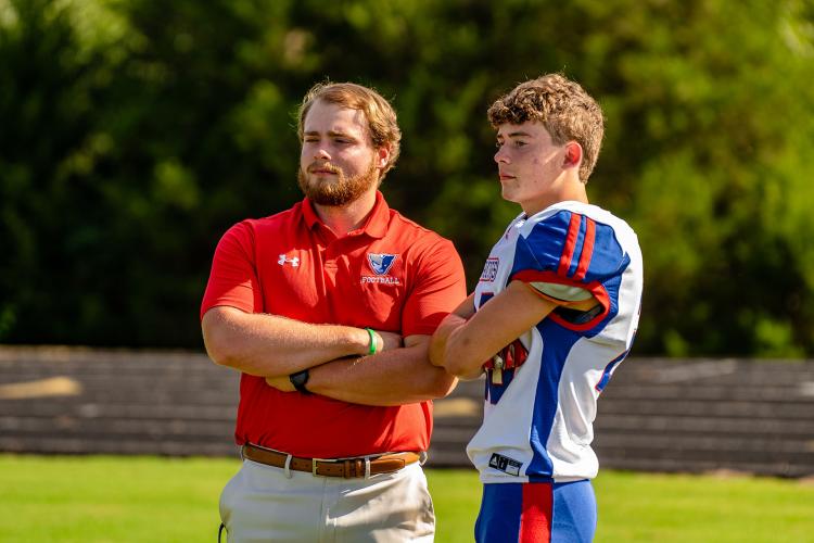 Defensive line coach Webb Allgood and his brother Brady Allgood. (Photo/Jack Casey)