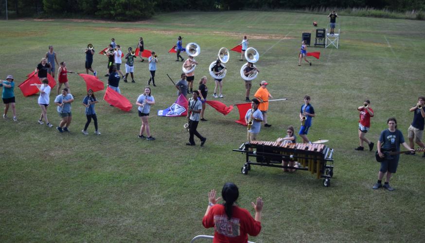 The OCHS marching band will perform a show called “Fire and Ice,” which will require drum majors on both sides of the field because it has “a lot of moving parts,” said Charlie Brewer, a drum major. (Photo/Wade Cheek)