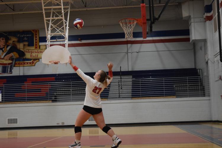 Sofia Horsley serves the ball during Oglethorpe County’s 3-0 home-opening victory over Putnam County last Thursday. (Photo/Wade Cheek)