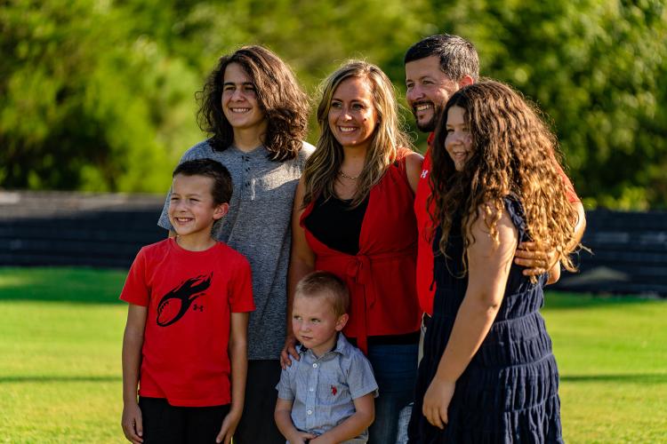 Oglethorpe County football coach Mike Holland with his wife Jessica and their children Kingston, Khalissa, Korbin, and Kamden. (Photo/Jack Casey)