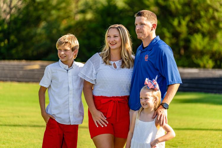 Cheerleading coach Morgan Williams with husband Cody Williams and their children Hayden and Brooklynn. (Photo/Jack Casey)