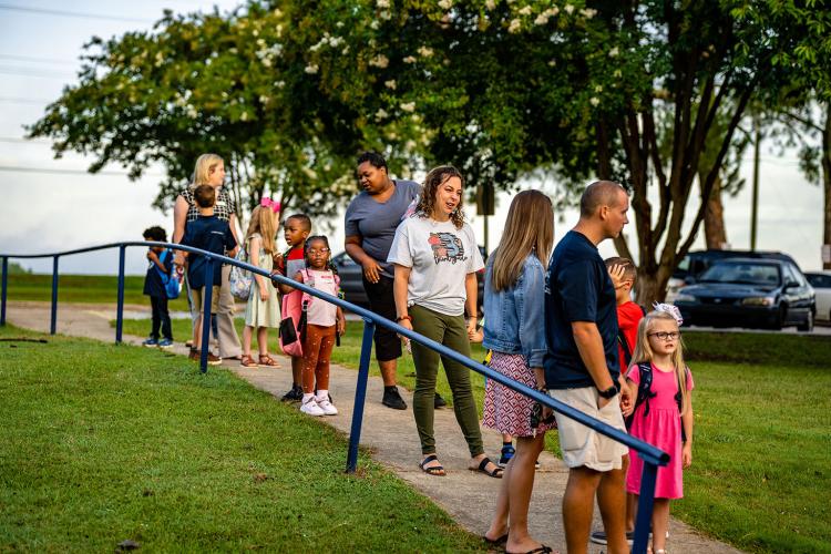 Students and their families wait to head inside Oglethorpe County Primary School for their first day of class. (Photo/Jack Casey)