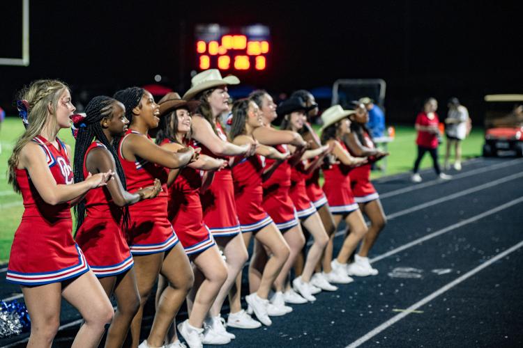 The OCHS cheerleaders perform during the football team’s 42-0 victory over Lake Oconee Academy on Friday night. The Patriots improved to 2-1 for the first time since 2012. (JACK CASEY/THE OGLETHORPE ECHO)