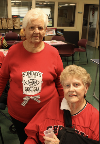 (Andrea Gutierrez/The Oglethorpe Echo) Sisters-in-law Gloria Peterman, left, and Patsy Cruce, right, spend time at the Oglethorpe Senior Center in Crawford.