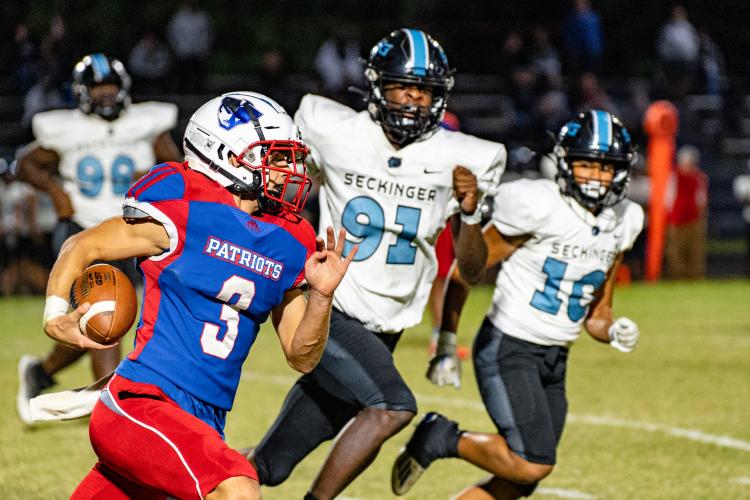 OCHS quarterback Will Sampson cuts upfield for a part of his 76 yards rushing in the win. He also threw three touchdown passes. (Jack Casey/The Oglethorpe Echo)