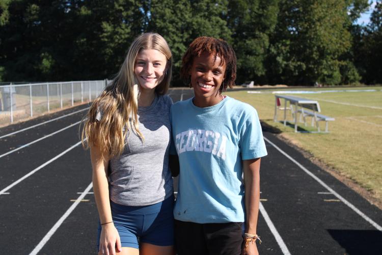 Lizzie Wadsworth (left) and Sydnie Henderson are the top two runners on OCHS's girls cross country team. (De Turner/The Oglethorpe Echo)