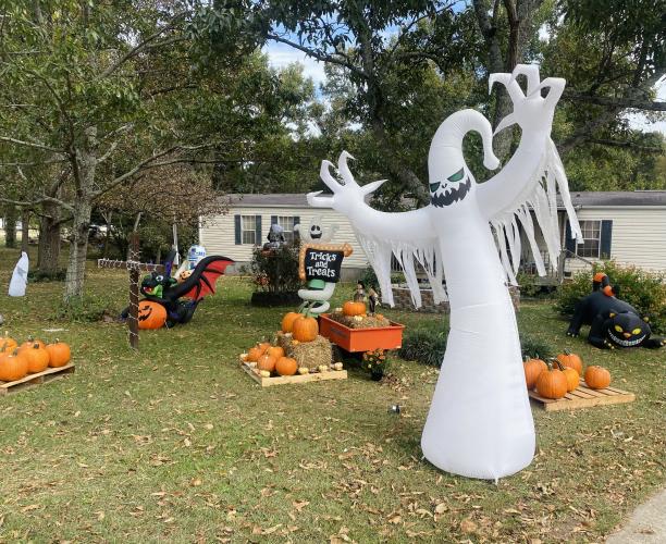 Loggans' front yard features 23 Halloween inflatables, as well as pumpkin displays designed and arranged by his wife, Tammy. (Photo/Ashley Balsavias)
