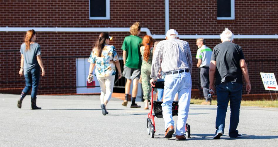 Voters line up to enter the Sonlight Baptist Church, Beaverdam, GA, Oglethorpe County, Tuesday, Nov. 8, 2022. Sonlight Baptist Church is one of two churches serving as polling locations in Oglethorpe County. (Photo/Aisha Schulz)