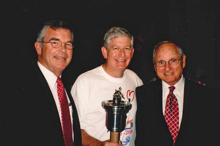 To celebrate the 10th anniversary of the 1996 Olympics, Athens and the University of Georgia re-enacted the torch run. As chairman of Athens 96, I invited Billy Payne, left, and Vince Dooley, right, to speak at the ceremony. (Submitted Photo)