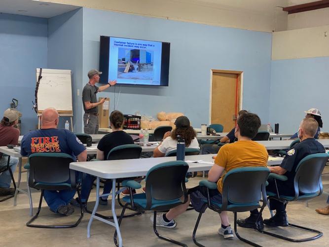Cody Gibbs, assistant chief at the Beaverdam Volunteer Fire Department, instructs volunteer firefighters-in-training about hazmat incidents. (Photo/submitted)