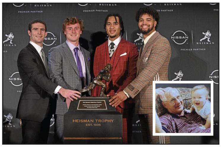 Gridiron savvy is in Stetson Bennett IV’s DNA. Stetson’s grandfather Buddy, holding him in the family photo inset, was a stellar, scrambling quarterback at Jesup High School and the University of South Carolina. Buddy Bennett died in 2016, but he would have loved being in New York to see his grandson honored as one of the four Heisman Trophy finalists. The 2022 honorees are (from left) Bennett, TCU’s Max Duggan, Ohio State’s C.J. Stroud and Southern Cal’s Caleb Williams. (TODD VAN EMST)