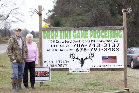 Drop Tine owner Phil Wilson, with his mom Ester Wilson, said damages to his processing facility could cost up to $20,000 to repair. (KYLE SOTO/THE OGLETHORPE ECHO)