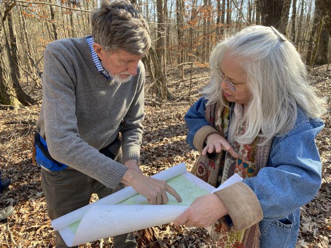 Tom Gresham, who has played a key role in mapping Oglethorpe County's cemeteries, shows Church Crow features on a map. (Photo/Erin Kenney)