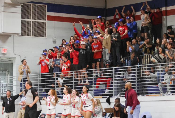 The OCHS student section cheers on the Lady Patriots during their region game against Prince Avenue Christian School. (Photo/Emily Dozier)