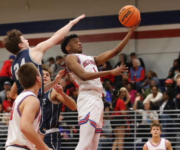 Junior Javaun Pittard drives a shot up to the basket during Oglethorpe County High School basketball's game against Prince Avenue Christian School on Feb. 3, 2023. The Patriots defeated the Wolverines 49-46 in the region matchup. (Photo/Emily Dozier)