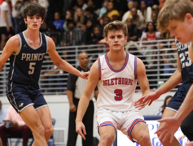 Senior Will Sampson keeps his eyes on the ball during Oglethorpe County basketball's game against Prince Avenue. (Photo/Emily Dozier)