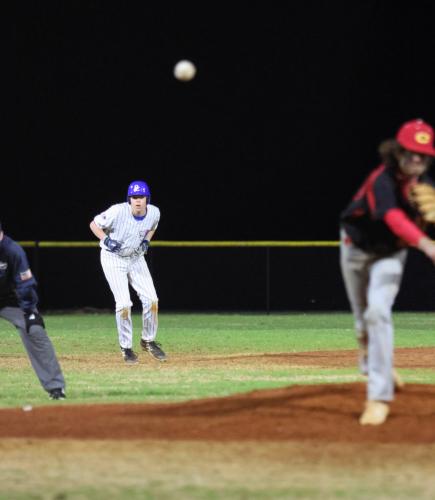 Eli Frost, a sophomore, leads off second base during his teammate's at-bat. (Photo/Emily Dozier)