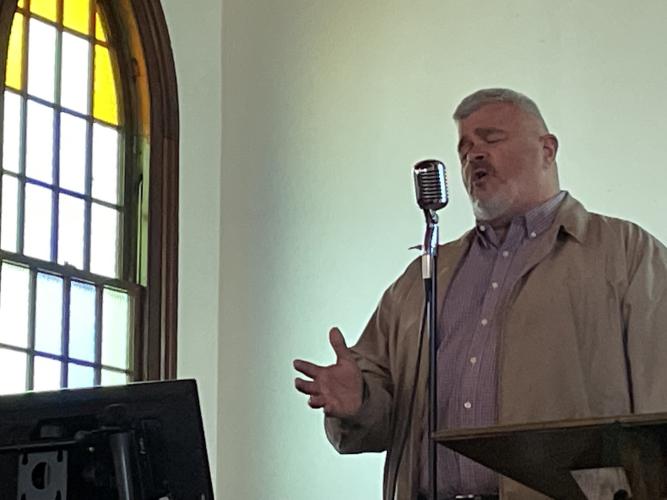 Ken Mobley sings as fellow performers look on at "An Old-Fashioned Fifth Sunday Gospel Sing" at the Beth-Salem Presbyterian Church on Sunday. The event was part of the Lexington Downtown Development Authority's 2023 Concert Series, which is raising funds for a community center in the Macon Coil building. (Photo/Gray Jones)