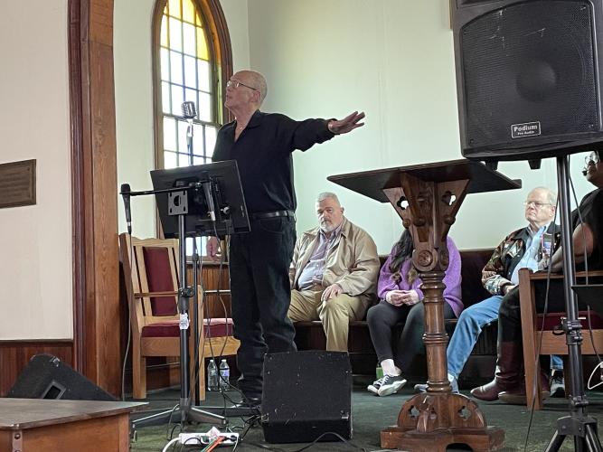 Chip Rosenthal sings as fellow performers look on at "An Old-Fashioned Fifth Sunday Gospel Sing" at the Beth-Salem Presbyterian Church on Sunday. The event was part of the Lexington Downtown Development Authority's 2023 Concert Series, which is raising funds for a community center in the Macon Coil building. (Photo/Gray Jones)