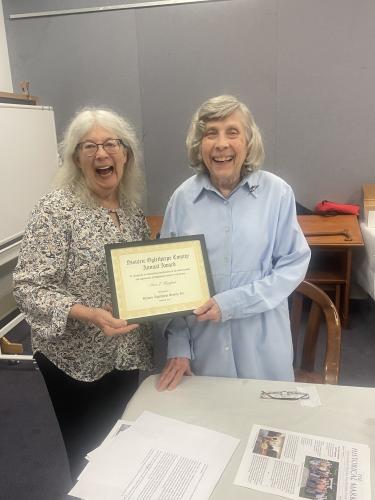 Kathleen deMarrais (left) and Alice H. Hughes (right) moments after Hughes received an award from Historic Oglethorpe County. (RAMON ELORTONDO/THE OGLETHORPE ECHO)