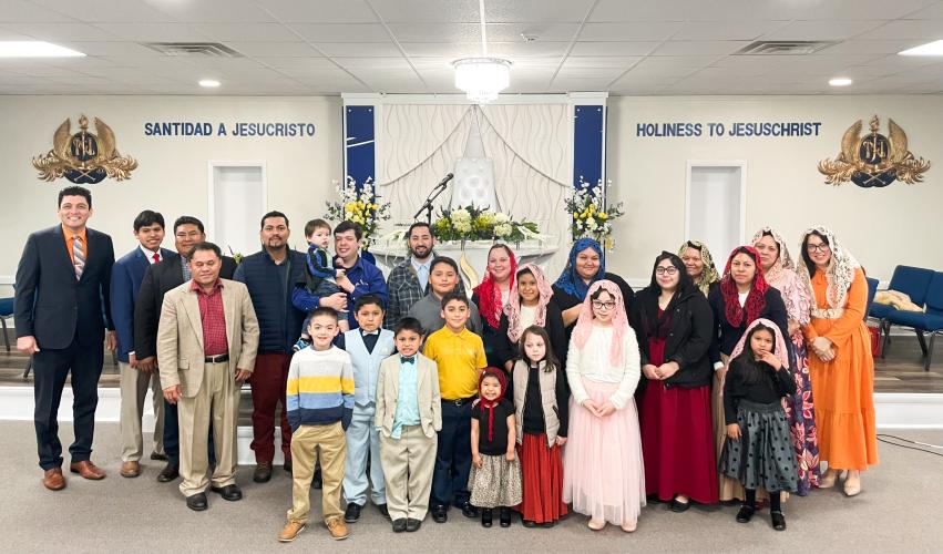 Members of The Light of The World Church congregate in their temple in Lexington earlier this year. The temple opened more than two years ago to provide a home to church members in this area. (Photo/Maddie Daniel)