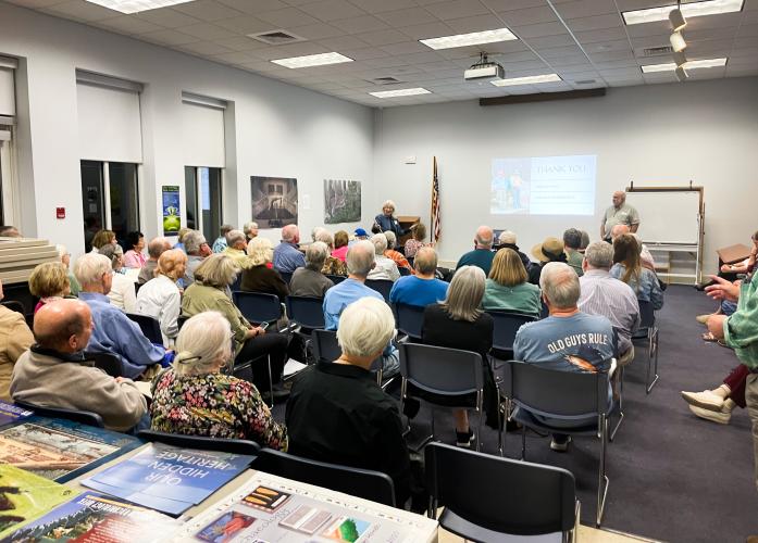 Historic Oglethorpe County President Kathleen deMarrais thanks guests for attending archeologist James Wettstaed’s lecture on Native American history on March 28, 2023. This month’s meeting drew an unprecedented crowd, with almost 70 people gathered at the Oglethorpe County Library in Lexington. (Photo/Maddie Daniel)