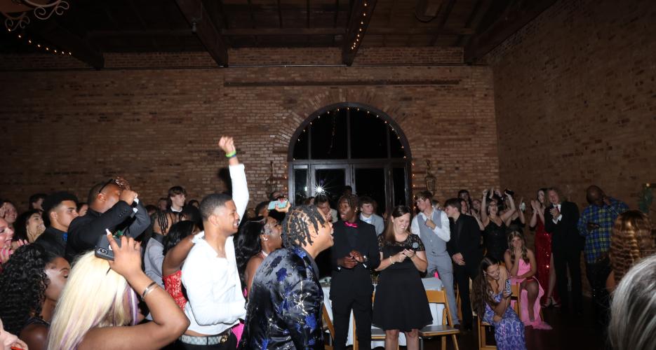 Students react to the announcement of Nadia Henderson as prom queen. (LANDEN TODD/THE OGLETHORPE ECHO)