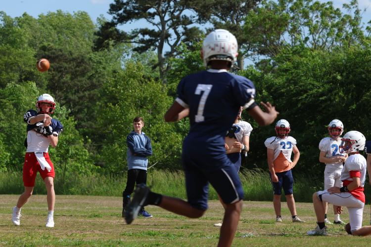 Oglethorpe County’s Hunter Hall (30) throws to Nicah Pass (7) at spring practice last week. The Patriots began drills on May 9 and will continue through the spring game at Chestatee at 7 p.m. Thursday, May 18. (LANDEN TODD/THE OGLETHORPE ECHO)