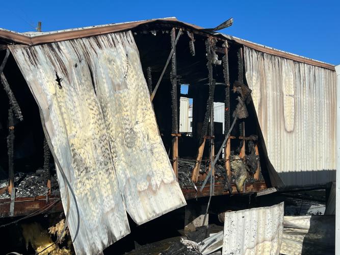(SUBMITTED PHOTO) The storage trailer that burned at OCES on Monday was one of five on the property. The remaining ones are being inspected for electrical issues, Superintendent Beverley Levine said.
