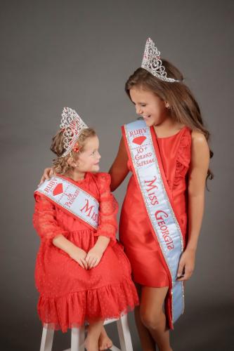 Isabella Raines (left) smiles with her aunt, Madalyn Raines (right), at the Ruby Elite Wonderland State pageant last year. (SUBMITTED PHOTO)