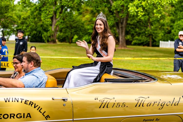 Miss Marigold — Roma Ellenberg, a 2021 Oglethorpe County High School graduate — rides in the Marigold Festival parade last year. This year’s festival is scheduled for Pittard Park on Saturday, May 13. (JACK CASEY/THE OGLETHORPE ECHO)
