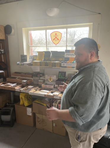 Community Cigar President Glynn Segars increased his customer base by building a website. (ALEX BAVOSA/THE OGLETHORPE ECHO)