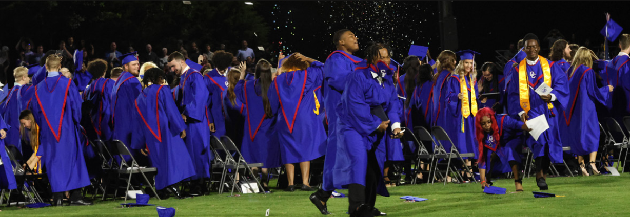 Members of the OCHS senior class rejoice on the football field after graduating on Friday at Patriot Stadium. (LANDEN TODD/THE OGLETHORPE ECHO)