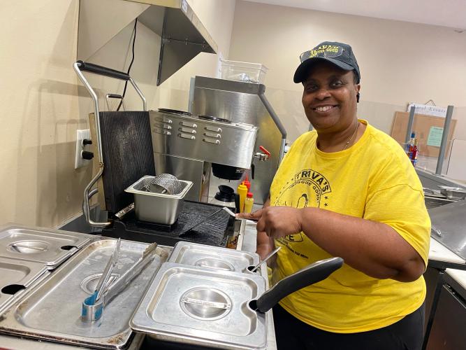 Trava Barnett not only owns and runs Trava’s Dog Gone Good Cafe in Lexington, but also a hot dog cart that she operates on the weekends in Downtown Athens. She’s one of several county business owners who have found ways to attract new audiences for their products. (DINK NESMITH/THE OGLETHORPE ECHO)
