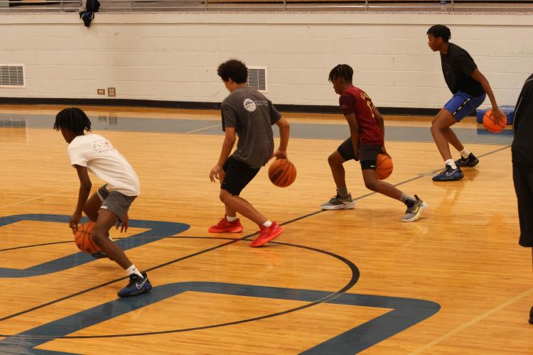 Each camper participated in several drills, including basic warmups and stretches, practicing free throws or dribble moves or having fun with a game of knockout at the OCHS gym. (LANDEN TODD/THE OGLETHORPE ECHO)