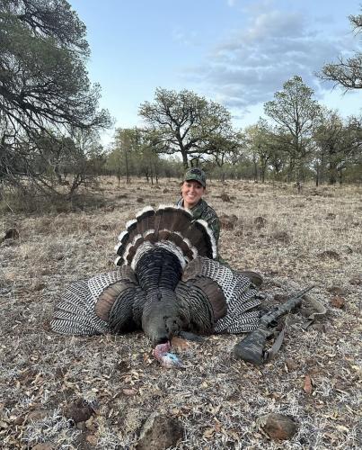 Paige Hill Murphy completed the World Turkey Slam with this Gould's turkey that checked in at 18 pounds. Gould’s turkeys are primarily found in Mexico. (SUBMITTED PHOTO)